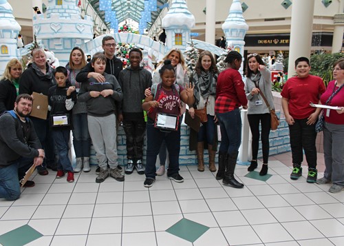 Group shot of the class near Santa's castle at the mall.
