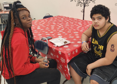 Two students sitting at a table