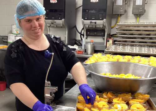 Intern working in the kitchens at URMC