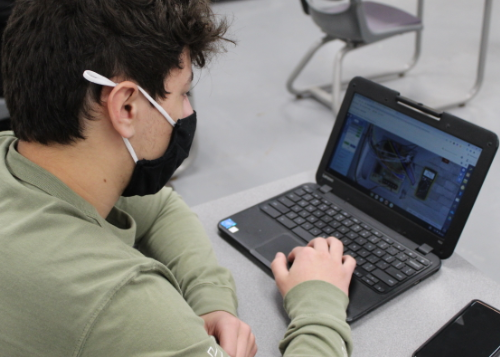 Student learning on a laptop