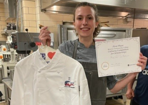 Rachel LaRocca with winning prizes of a chef's coat and scholarship certificate