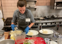 Rachel LaRocca preparing food in competition