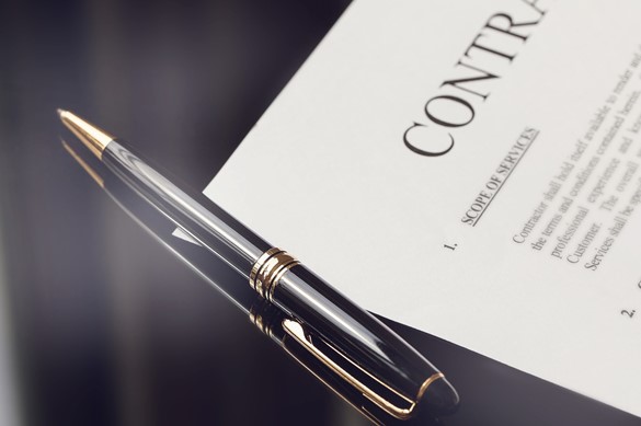 contract documents and fountain pen on black desk, business concepts 