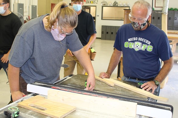Carpentry student with instructor