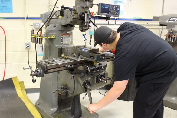 Student in the machine shop at CTE