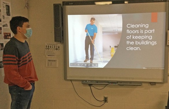 Student sharing a report on screen