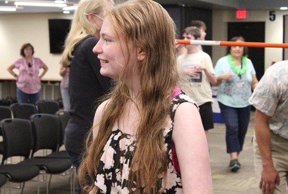 Smiling student wearing flowered dress