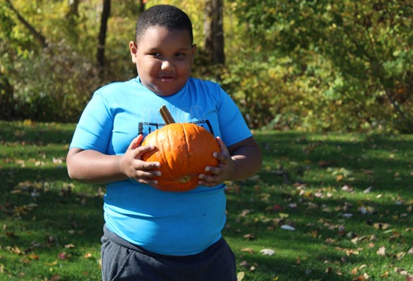 Student with pumpkin