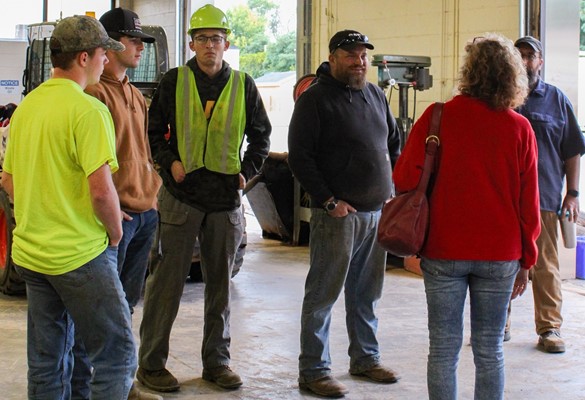 CTE students speaking with a visitor