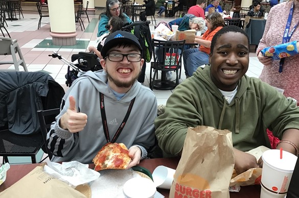 Two students on a field trip to the mall