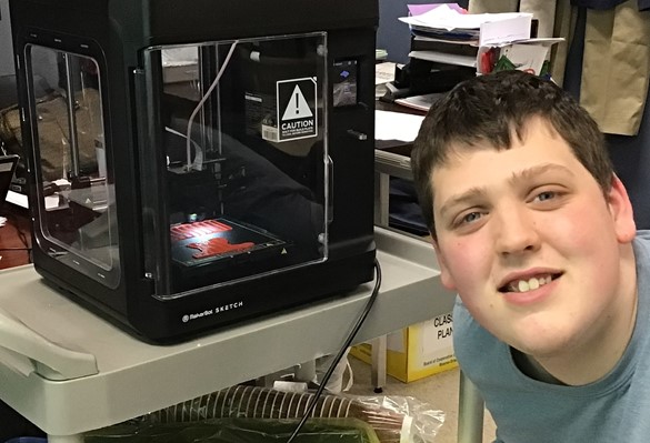 Student with 3-D printer