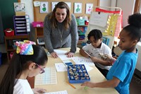 Teacher with students