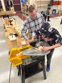 Teacher and student in the workshop